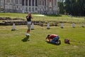 One girl blogger photographs another on the background of a historic building. Russia, Moscow, Tsaritsyno - 09 01 2019