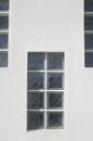 One glass block window looking outside on wall Royalty Free Stock Photo