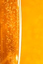 One glass of champagne on golden blurred background. Macro Royalty Free Stock Photo