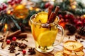 One glass mulled white wine on a rustic wooden table. Selective focus, copy space background, top view, flat lay