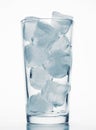 One glass of water full of ice cubes, white background, blue toned object