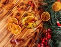 One glasses mulled white wine on a rustic wooden table. Selective focus, copy space background, top view, flat lay