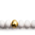 White eggs and Golden egg Royalty Free Stock Photo