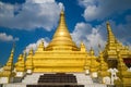 One of the golden stupas of the Buddhist temple Kuthodaw Pagoda. Mandalay