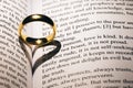 Golden wedding ring on bible book Royalty Free Stock Photo