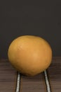 One grapefruit on a bamboo background Royalty Free Stock Photo