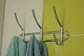 one gray metal hanger with hooks Royalty Free Stock Photo