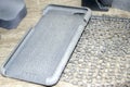 One gray model phone cover printed on 3D printer. Object printed 3D printer