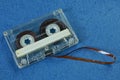 gray old audiotape lies on the blue board