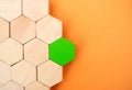 One green hexagon stands out from the rest. Leadership and victory concept. Dissimilarity and dissent. Uniqueness initiative. Royalty Free Stock Photo