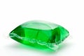 One green laundry detergent capsule Royalty Free Stock Photo