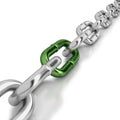 One green link in a chrome chain Royalty Free Stock Photo