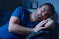 One man sleeping and snoring watching television Royalty Free Stock Photo