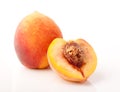 One and half peaches isolated Royalty Free Stock Photo