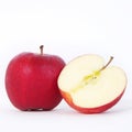 One and a half red apples over white background Royalty Free Stock Photo