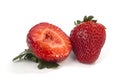 One and half strawberry on white Royalty Free Stock Photo