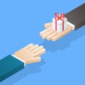 One hand giving gift box to other. Royalty Free Stock Photo