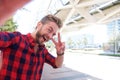 One handsome smiling man taking fun selfie Royalty Free Stock Photo