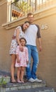 One happy family. Portrait of a happy family standing outside their house. Royalty Free Stock Photo