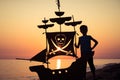 One happy little boy playing on the beach at the sunset time. Royalty Free Stock Photo