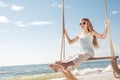 One happy little girl playing on the beach at the day time. Royalty Free Stock Photo