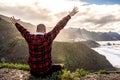 One happy man sitting, relaxing and looking at beautiful ocean landscape Royalty Free Stock Photo