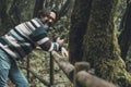 One happy man smiling looking on camera. People enjoying nature in outdoor leisure activity. Tourist have fun in the forest woods Royalty Free Stock Photo