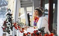 One happy young adult woman smile and enjoy sun outside her home in winter christmas holiday season vacation. Copy space. Hotel Royalty Free Stock Photo