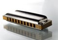 One harmonica on a white background Royalty Free Stock Photo