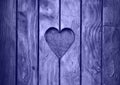 One heart shape carved in vintage wood close up Royalty Free Stock Photo