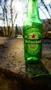 One Heineken glass bottle seen against the light. Danish beer well known for its green bottle Royalty Free Stock Photo