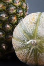 one honeydew, a fresh pineapple Royalty Free Stock Photo