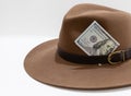 One hundred american dollars banknote close-up in brown felt hat Royalty Free Stock Photo