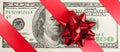 One hundred bill with red bow and ribbon Royalty Free Stock Photo