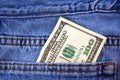 One hundred dollar bill in jeans pocket Royalty Free Stock Photo