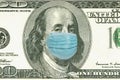 One Hundred Dollar Bill With Medical Face Mask on Benjamin Franklin Royalty Free Stock Photo