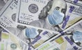 One Hundred Dollar Bill With Medical Face Mask on Benjamin Franklin. Coronavirus affects global stock market. World economy hit by Royalty Free Stock Photo