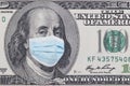 One hundred dollars banknote with facemask