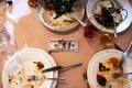 One hundred dollars lie among the dirty dishes, tips