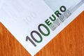 One hundred Euro currency banknotes, closeup. Royalty Free Stock Photo