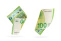 One hundred euro banknote set isolated on white background. European money folded in half, close-up of money casts a Royalty Free Stock Photo