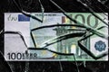 one hundred euro banknotes with broken glass. financial crisis concept Royalty Free Stock Photo