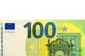 One hundred 100 euros in one banknote close-up. Part of the money of the European currency on a white background. Royalty Free Stock Photo