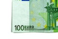 One hundred 100 euros in one banknote close-up. Part of the money of the European currency on a white Royalty Free Stock Photo