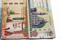 One hundred Saudi Arabia riyals cash money banknote 100 SAR features king Salman and the prophet mosque with 200 LE EGP two Royalty Free Stock Photo