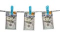 One hundred us dollars are drying on cord isolated Royalty Free Stock Photo