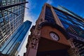 One kansas city place and an historic clock tower on the corner Royalty Free Stock Photo