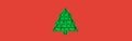 One kids anti stress pop it toy in form of green Christmas tree on red. Banner. Copy space.