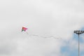 One Kite Flying over a Cloudy Sky Royalty Free Stock Photo