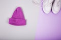 One knitted purple hat and modern pink shoes Royalty Free Stock Photo